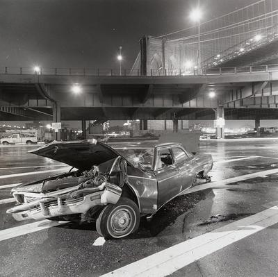 [wrecked car on road]