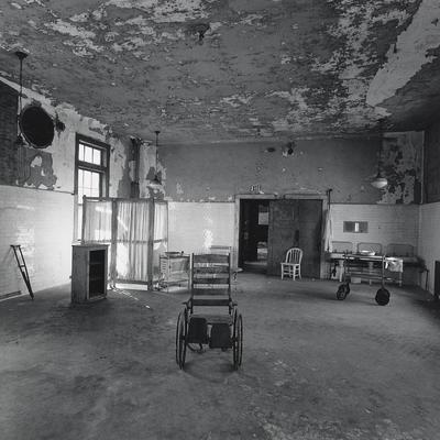 [shabby room with old medical equipment]