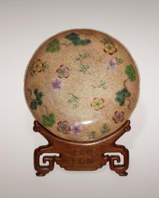 Polychrome dish, one of a pair