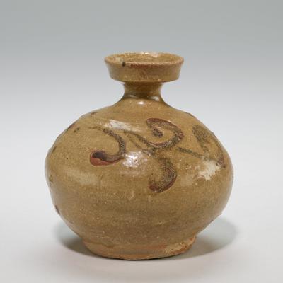 Bottle with floral motif