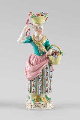 Woman with basket of flowers figure