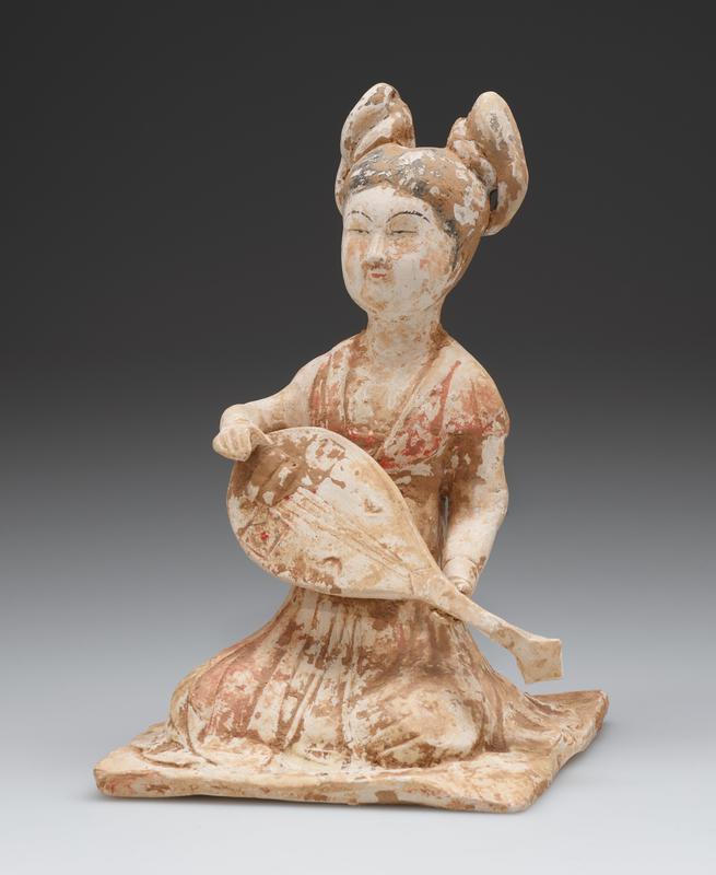 Tomb figure of a musician playing a lute