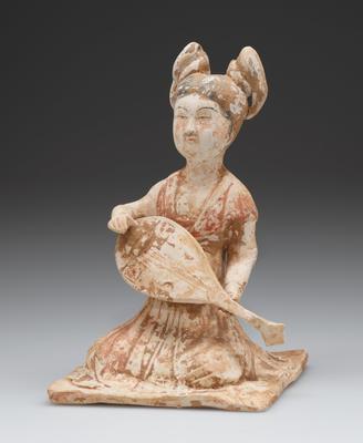 Tomb figure of a musician playing a lute